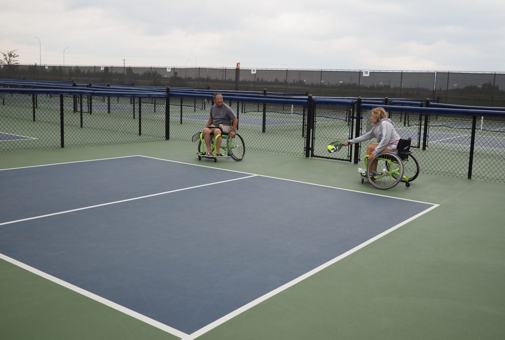 Carol Graham, organizer of the Para Pickleball Try It event and partner Rick